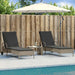 Ligstoelen 2 st met kussen poly rattan lichtgrijs