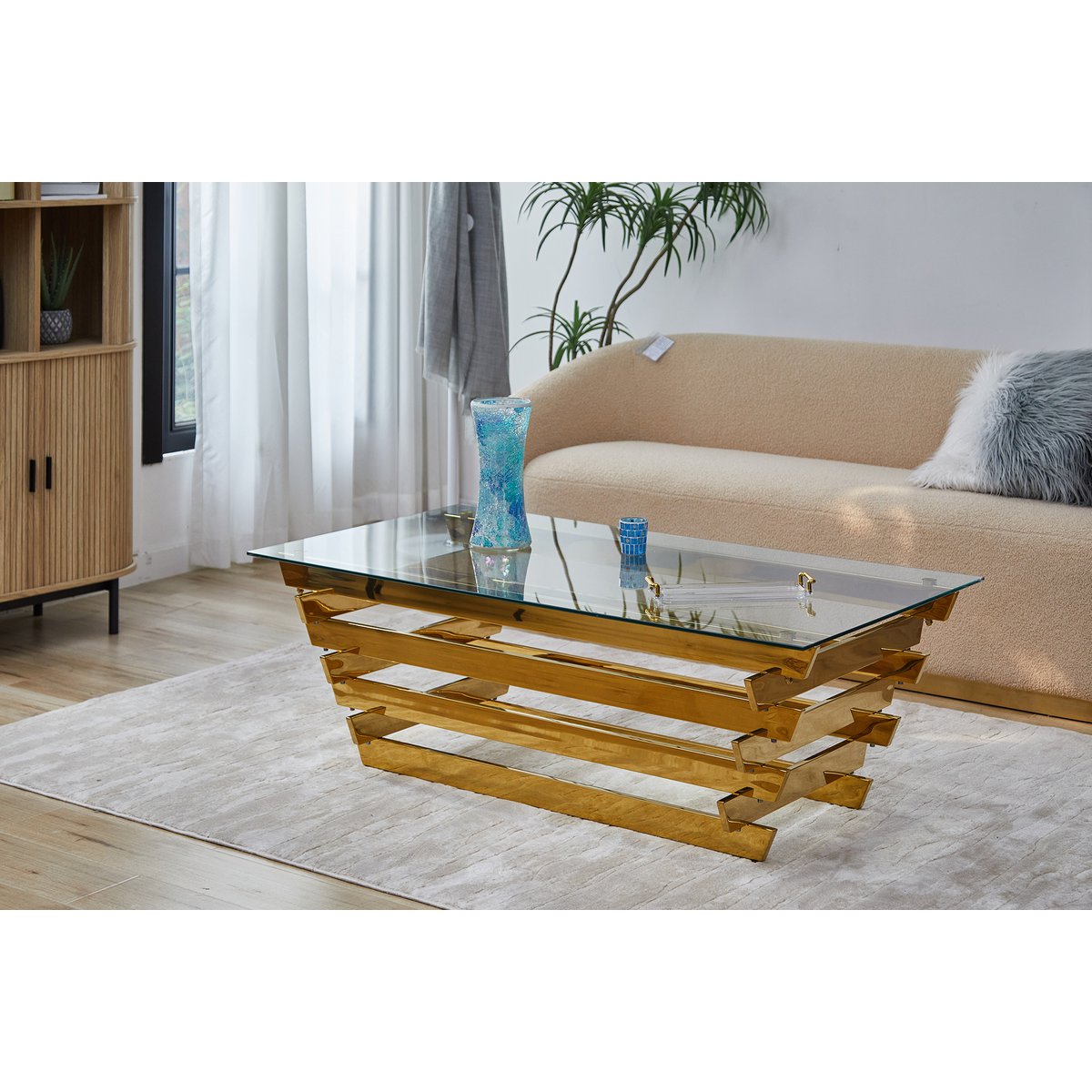 Salontafel 130x70 cm goud/helder glas