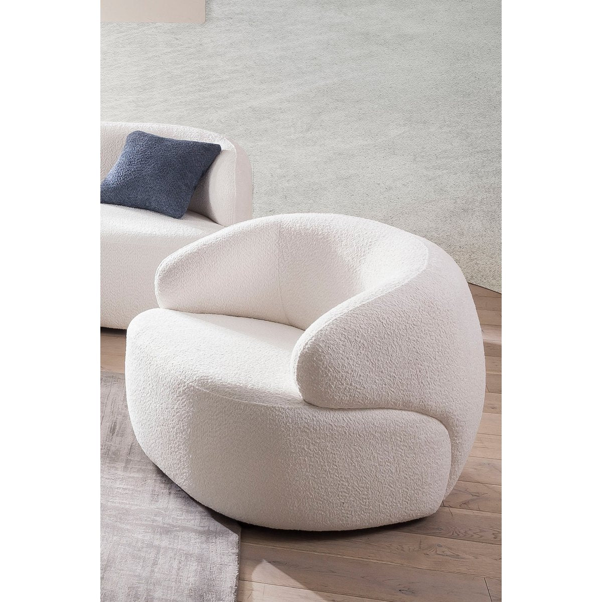 Fauteuil bouclé stof wit